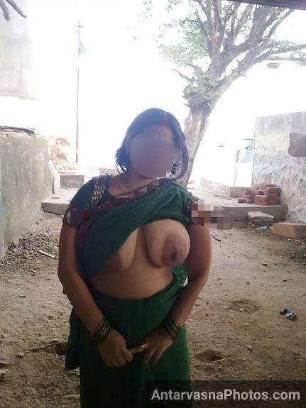 https://www.antarvasnaphotos2.com/wp-content/uploads/2017/07/khet-ke-pichhe-aunty-ne-boobs-khole.jpg